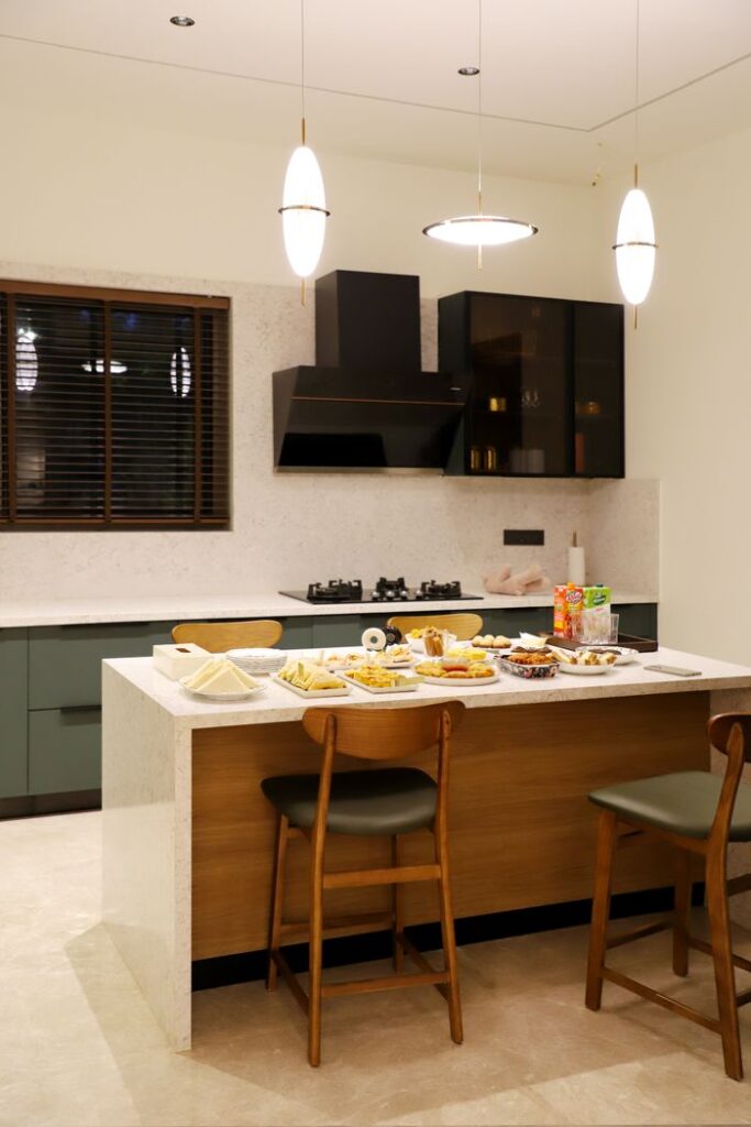 Cozy modern kitchen with a variety of food on the island table, perfect for culinary shoots.