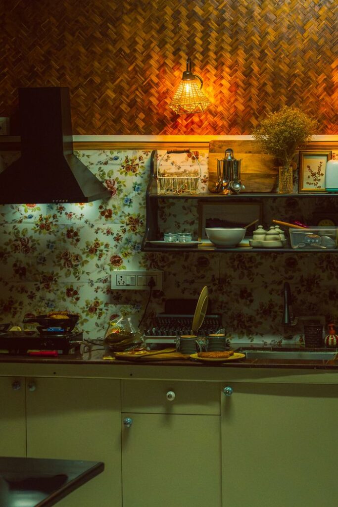 Warm and cozy kitchen setting with traditional decor and soft lighting in India.
